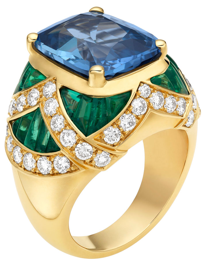 Bvlgari ring in yellow gold, cushion shaped sapphire, and cabochon cut emerald and pave diamonds