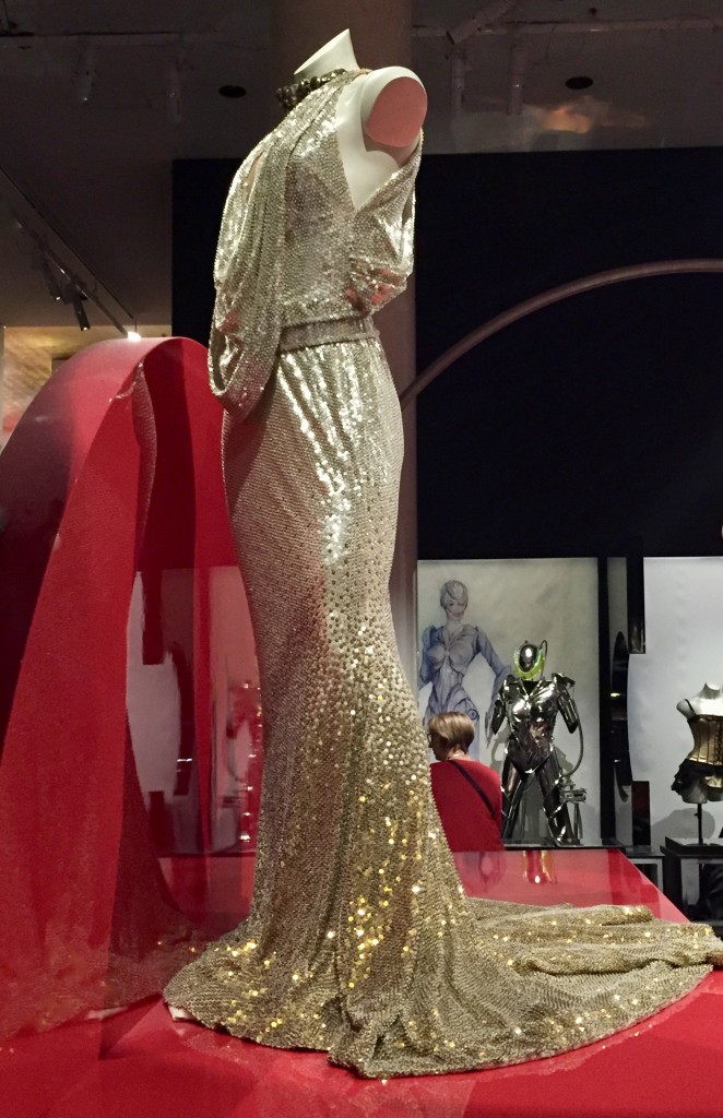 Kylie:  For you, For me Tour 2009.  Halter neck gown covered with silver and gold degrade sequence and beads  Designed by Jean Paul Gaultier  Photograph GRACIE