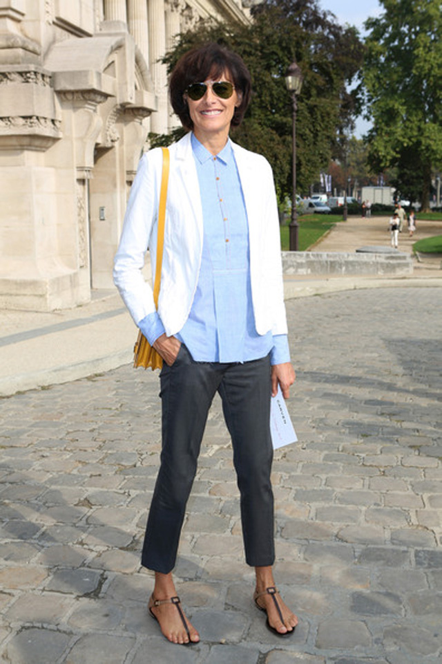 Ines de la Fressange covers many bases with a neutral mix - cropped pants & jacket, comfortable shirt, well chosen bag & sandals 